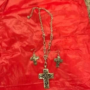 Silver cross necklace/earring set.